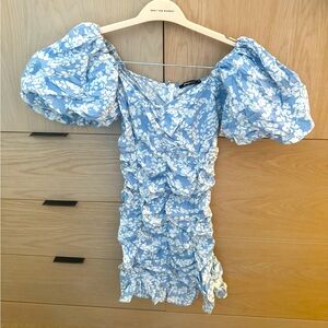 Gina Tricot puff sleeve dress with blue and white floral pattern. EU size 34